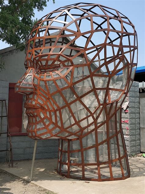 不锈钢镂空人头雕塑