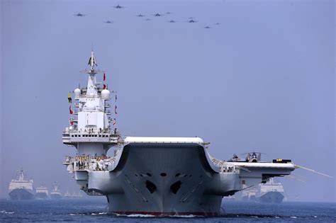 外媒评价中国军舰横切美舰
