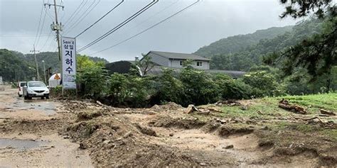 韩国暴雨28人死亡新闻